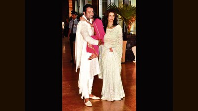 Leander Paes with live-in parter Rhea Pillai at Riteish, Genelia's wedding. Leander Paes with live-in parter Rhea Pillai at Riteish, Genelia's wedding.