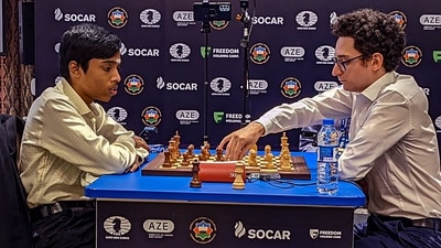 India chess player Praggnanandhaa and Fabiano Caruana (PTI) India chess player Praggnanandhaa and Fabiano Caruana (PTI)