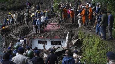 Rescuers removing debris as they search for people feared trapped after a landslide near a temple on the outskirts of Shimla on August 14. (AP file photo) Rescuers removing debris as they search for people feared trapped after a landslide near a temple on the outskirts of Shimla on August 14. (AP file photo)