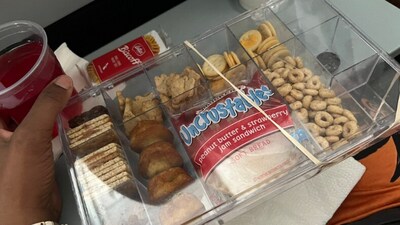 Snapshot of the snack box that the American Airlines attendant 'snatched.' (Twitter/@dynamicallydara)