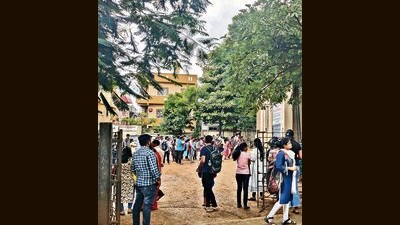 The initial delay caused confusion among candidates, and the exam, which was slated to begin at 9 am, was later rescheduled for 2 pm owing to server failure. (RAHUL RAUT/ HT PHOTO) The initial delay caused confusion among candidates, and the exam, which was slated to begin at 9 am, was later rescheduled for 2 pm owing to server failure. (RAHUL RAUT/ HT PHOTO)