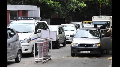 Traffic police have also been deployed at the Panjab University gates as the vehicles stopped for checking or denied entry often cause traffic snarls on the main road. (HT File Photo) Traffic police have also been deployed at the Panjab University gates as the vehicles stopped for checking or denied entry often cause traffic snarls on the main road. (HT File Photo)