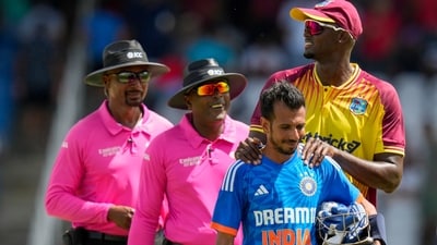 Jason Holder embraces Yuzvendra Chahal after a match between India and West Indies (AP) Jason Holder embraces Yuzvendra Chahal after a match between India and West Indies (AP)