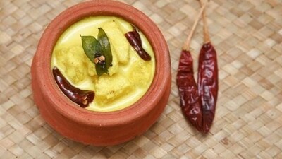 Pachadi: This is a yogurt-based dish made with either pineapple or bitter gourd and grated coconut. (File Photo) Pachadi: This is a yogurt-based dish made with either pineapple or bitter gourd and grated coconut. (File Photo)