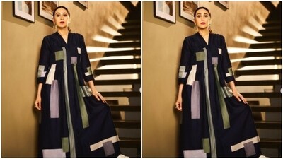 Karisma's long ethnic attire featured block prints in shades of green, violet and silver. In a sleek bun and statement earrings, Karisma completed her look. (Instagram/@therealkarismakapoor) Karisma's long ethnic attire featured block prints in shades of green, violet and silver. In a sleek bun and statement earrings, Karisma completed her look. (Instagram/@therealkarismakapoor)