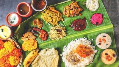 Onam, the 10-day-long harvest festival, marks the beginning of the Malayalam year Kollavarshamis. The term "Sadhya" in Malayalam translates to a grand banquet. This culinary spread encompasses an assortment of 26 distinct curries, fried vegetables, sweet delicacies, and more, all meticulously crafted from a staggering assemblage of over 60 ingredients. For those who aren't native to Kerala yet wish to experience these flavors, here are 10 dishes you can recreate in your own kitchen. (Pexels) Onam, the 10-day-long harvest festival, marks the beginning of the Malayalam year Kollavarshamis. The term "Sadhya" in Malayalam translates to a grand banquet. This culinary spread encompasses an assortment of 26 distinct curries, fried vegetables, sweet delicacies, and more, all meticulously crafted from a staggering assemblage of over 60 ingredients. For those who aren't native to Kerala yet wish to experience these flavors, here are 10 dishes you can recreate in your own kitchen. (Pexels)
