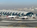 Emirates planes are seen on the tarmac in a general view of Dubai International Airport in Dubai, United Arab Emirates. Dubai airport tops pre-pandemic passenger traffic in first half of the year 