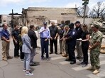 U.S. President Joe Biden and first lady Jill Biden accompanied by Hawaii Governor Josh Green, Jaime Green, First Lady of Hawaii and FEMA administrator Deanne Criswell, visit the fire-ravaged town of Lahaina on the island of Maui in Hawaii, U.S., August 21, 2023. REUTERS/Kevin Lamarque