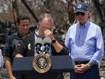 U.S. President Joe Biden stands as Hawaii Governor Josh Green gestures as they visit the fire-ravaged town of Lahaina on the island of Maui in Hawaii, U.S., August 21, 2023. REUTERS/Kevin Lamarque