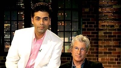 Karan Johar with Richard Gere in a still from a Koffee With Karan season 2 episode. Karan Johar with Richard Gere in a still from a Koffee With Karan season 2 episode.