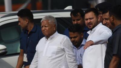 Bihar deputy chief minister Tejashwi Yadav and RJD chief Lalu Yadav during Independence Day functions at Gandhi Maidan in Patna (HT Photo/Santosh Kumar) Bihar deputy chief minister Tejashwi Yadav and RJD chief Lalu Yadav during Independence Day functions at Gandhi Maidan in Patna (HT Photo/Santosh Kumar)