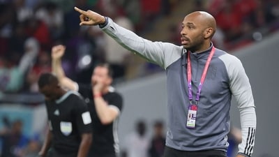 (FILES) Belgium's French assistant coach Thierry Henry reacting during the Qatar 2022 World Cup (AFP)