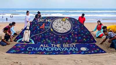 Students of Sudarsan Sand Art Institute create a sand art on ISRO's lunar mission Chandrayaan-3 at the beach in Puri (PTI) Students of Sudarsan Sand Art Institute create a sand art on ISRO's lunar mission Chandrayaan-3 at the beach in Puri (PTI)