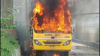The district fire department received a call at 12.50pm about a burning school bus and dispatched two fire tenders to the scene. (Sakib Ali/HT Photo)