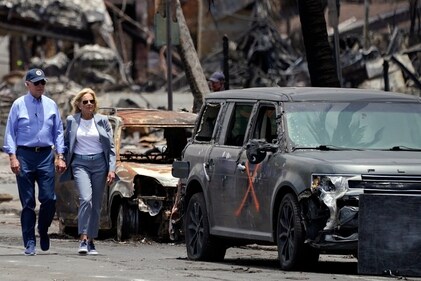 President Joe Biden and first lady Jill Biden tour areas devastated by the Maui wildfires, Monday, Aug. 21, 2023, in Lahaina, Hawaii. (AP Photo/Evan Vucci) (AP) President Joe Biden and first lady Jill Biden tour areas devastated by the Maui wildfires, Monday, Aug. 21, 2023, in Lahaina, Hawaii. (AP Photo/Evan Vucci) (AP)