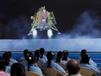 People watch a live stream of Chandrayaan-3 spacecraft's landing on the moon, inside an auditorium of Gujarat Science City in Ahmedabad.