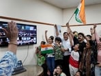 Indians celebrate the successful landing of Chandrayaan-3 at the Nehru Planetarium in New Delhi. Indians celebrate the successful landing of Chandrayaan-3 at the Nehru Planetarium in New Delhi.