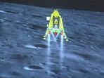 A screenshot shows a representation of Chandrayaan-3's successful landing on the Moon's surface, A screenshot shows a representation of Chandrayaan-3's successful landing on the Moon's surface,