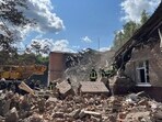 Rescuers clearing debris of a destroyed school following a Russian strike, in the town of Romny, Sumy region. (AFP) Rescuers clearing debris of a destroyed school following a Russian strike, in the town of Romny, Sumy region. (AFP)