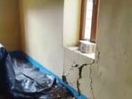 Houses in Solan developed cracks following heavy rainfall on Tuesday.