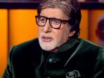 Amitabh Bachchan looked handsome in his deep green suit.