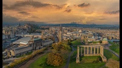 “This is a city of shifting light, of changing skies, of sudden vistas. A city so beautiful it breaks the heart again and again.” – Alexander McCall Smith on Edinburgh. A view of the city from Calton Hill that shows Edinburgh Castle, Waverley train station and the city centre. (Christopher Chambers/Shutterstock) “This is a city of shifting light, of changing skies, of sudden vistas. A city so beautiful it breaks the heart again and again.” – Alexander McCall Smith on Edinburgh. A view of the city from Calton Hill that shows Edinburgh Castle, Waverley train station and the city centre. (Christopher Chambers/Shutterstock)