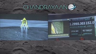 A view of Chandrayaan-3's Vikram Lander during its soft landing along side a countdown from the live telecast of the lander on the moon's surface at Indian Space Research Organisation's headquarters, in Bengaluru.