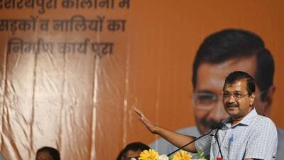 Delhi chief minister Arvind Kejriwal talks abour construction of roads and drains in Dasrathpuri Colony on Wednesday. (Vipin Kumar/HT Photo)