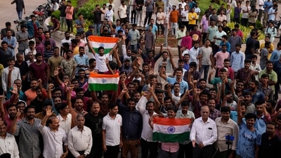 Students celebrate the successful landing of Chandrayaan-3, or "moon craft" while watching a live telecast at Omani University in Hyderabad. (AP) Students celebrate the successful landing of Chandrayaan-3, or "moon craft" while watching a live telecast at Omani University in Hyderabad. (AP)