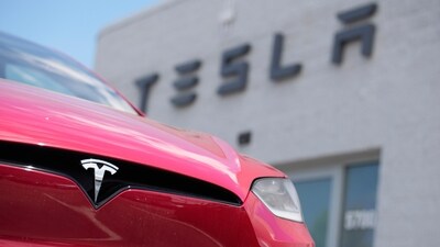 FILE - An unsold 2023 Model X sports-utility vehicle sits outside a Tesla dealership Sunday, June 18, 2023, in Littleton, Colo. (AP) FILE - An unsold 2023 Model X sports-utility vehicle sits outside a Tesla dealership Sunday, June 18, 2023, in Littleton, Colo. (AP)