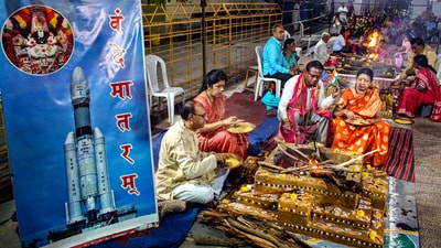 Priests and people perform prayers for ISRO's lunar mission Chandrayaan-3 successful landing on Moon's surface, at Jagdalpur, in Bastar district. (PTI) Priests and people perform prayers for ISRO's lunar mission Chandrayaan-3 successful landing on Moon's surface, at Jagdalpur, in Bastar district. (PTI)