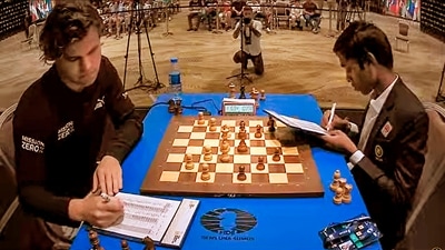 Praggnanandhaa and Magnus Carlsen during Fame 2 of the Chess World Cup 2023 final (PTI) Praggnanandhaa and Magnus Carlsen during Fame 2 of the Chess World Cup 2023 final (PTI)