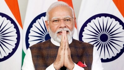 Prime Minister Narendra Modi greets while watching the telecast of Chandrayaan-3's successful soft landing on the Moon (PTI) Prime Minister Narendra Modi greets while watching the telecast of Chandrayaan-3's successful soft landing on the Moon (PTI)