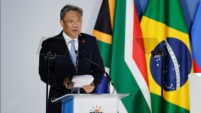 China's Minister of Commerce Wang Wentao delivers his remarks during the 2023 BRICS Summit at the Sandton Convention Centre in Johannesburg on Tuesday. (AFP) China's Minister of Commerce Wang Wentao delivers his remarks during the 2023 BRICS Summit at the Sandton Convention Centre in Johannesburg on Tuesday. (AFP)