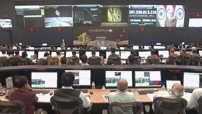 Scientists and engineers watch the live telecast of the Chandrayaan-3 lander Vikram's soft-landing on the moon's surface at Isro's headquarters, in Bengaluru on Wednesday.