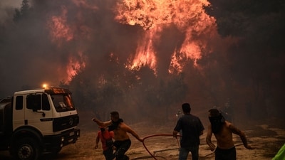 The temperature is expected to rise to just under 40C, while winds will remain strong fueling the blazes. (AFP) The temperature is expected to rise to just under 40C, while winds will remain strong fueling the blazes. (AFP)