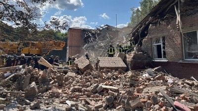 Rescuers clearing debris of a destroyed school following a Russian strike, in the town of Romny, Sumy region. (AFP) Rescuers clearing debris of a destroyed school following a Russian strike, in the town of Romny, Sumy region. (AFP)