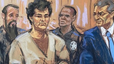 FTX cryptocurrency exchange founder Sam Bankman-Fried, wearing prison clothing, stands next to his attorney Christian Everdell in Manhattan federal court where he pleaded not guilty to seven criminal charges contained in a new indictment during a hearing before U.S. Magistrate Judge Sarah Netburn in New York City, U.S. August 22, 2023 in a courtroom sketch. (REUTERS)