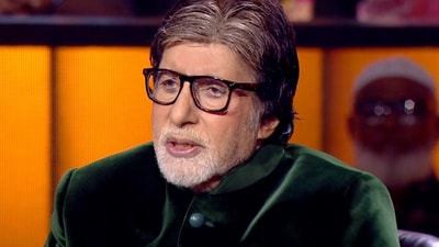 Amitabh Bachchan looked handsome in his deep green suit. Amitabh Bachchan looked handsome in his deep green suit.