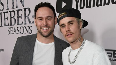 Scooter Braun and Justin Bieber. (Kevin Mazur / Getty Images for YouTube Originals) Scooter Braun and Justin Bieber. (Kevin Mazur / Getty Images for YouTube Originals)