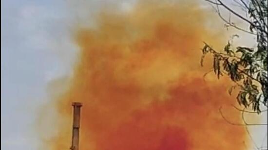 Orange-coloured clouds appeared in the sky above the factory around 2pm on Wednesday. (Video grab)