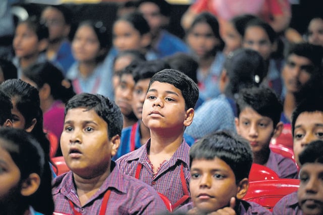 Students watch the live telecast. Despite heavy rainfall in Noida and Greater Noida, hundreds of students turned up to watch the screening, according to the principals of many government schools. (Sunil Ghosh/HT Photo) Students watch the live telecast. Despite heavy rainfall in Noida and Greater Noida, hundreds of students turned up to watch the screening, according to the principals of many government schools. (Sunil Ghosh/HT Photo)