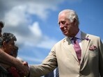 Royal Family: King Charles III reacts as he meets members of the public during a visit of the Sandringham Flower Show. Royal Family: King Charles III reacts as he meets members of the public during a visit of the Sandringham Flower Show.