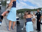 The image shows the woman hugging the man who recovered her lost phone from a lake in the US. The image shows the woman hugging the man who recovered her lost phone from a lake in the US.
