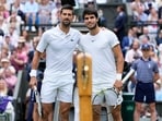 Serbia's Novak Djokovic (Left) and Spain's Carlos Alcaraz after the Wimbledon final.