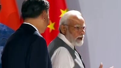Prime Minister Narendra Modi and Chinese President Xi Jinping engage in a brief interaction at the 15th BRICS Summit, in Johannesburg on Thursday. (ANI) Prime Minister Narendra Modi and Chinese President Xi Jinping engage in a brief interaction at the 15th BRICS Summit, in Johannesburg on Thursday. (ANI)