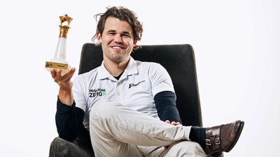 Norwegian world champion Magnus Carlsen poses for a picture with the trophy after clinching the title of the International Chess Federation World Cup 2023 in Baku, on Thursday (International Chess Federation ) Norwegian world champion Magnus Carlsen poses for a picture with the trophy after clinching the title of the International Chess Federation World Cup 2023 in Baku, on Thursday (International Chess Federation )
