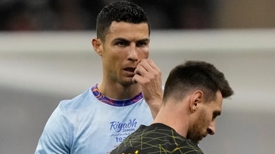 Cristiano Ronaldo and Lionel Messi during an exhibition match. (AP) Cristiano Ronaldo and Lionel Messi during an exhibition match. (AP)