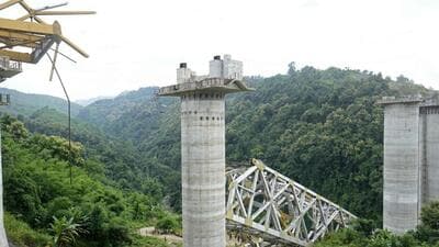 According to Northeast Frontier Railway (NFR) officials, 26 persons were working on the bridge when it collapsed. (AFP photo) According to Northeast Frontier Railway (NFR) officials, 26 persons were working on the bridge when it collapsed. (AFP photo)