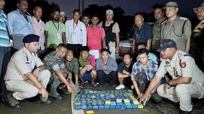 Assam Police personnel after the drug bust and arrests. (HT Photo) Assam Police personnel after the drug bust and arrests. (HT Photo)
